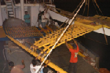 0131_marshall_islands_ loading_canoes